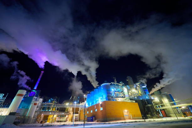 istock Factory at Night Air Pollution From Industrial Smoke 1293903288