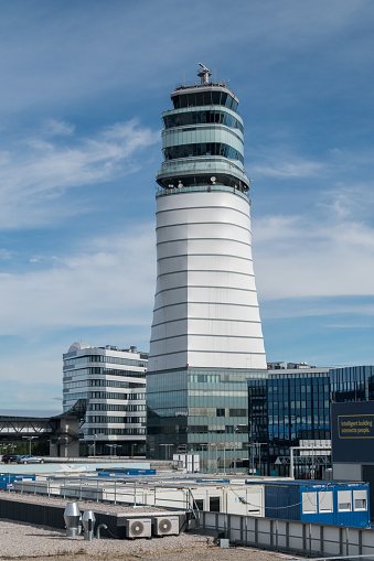 Vienna, Austria - August 31, 2020: Air traffic control tower at Vienna International Airport, or Flughafen Wien-Schwechat (VIE).
