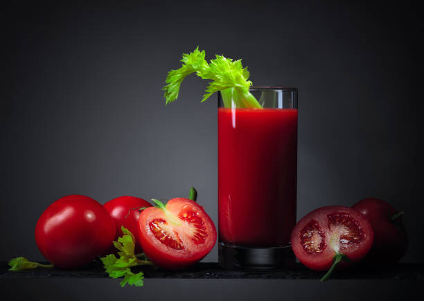 istock Tomato juice with tomatoes and celery 1293905178