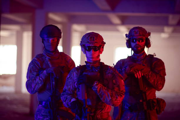istock soldier squad team portrait in urban environment colored lightis 1293905330