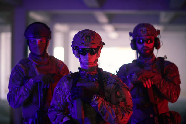 istock soldier squad team portrait in urban environment colored lightis 1293908004