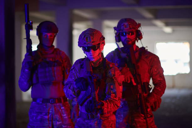 istock soldier squad team portrait in urban environment colored lightis 1293908072