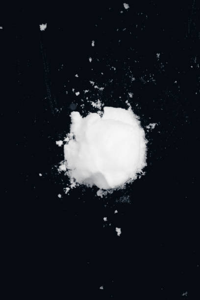 istock snowball splat on black wall 1293911039
