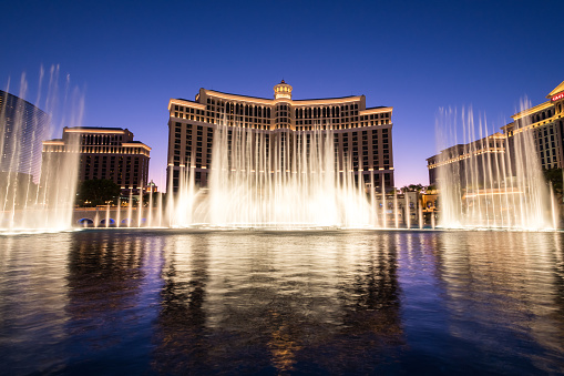 Las Vegas, USA - Sep 21, 2019: The free Bellagio water show at twilight on the Strip.