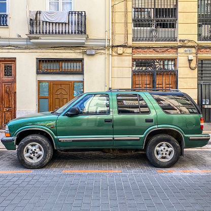Valencia, Spain - October 9, 2020: Green Chevrolet SUV model Blazer parked in the street. The american manufacturer produces this model in several countries and its origins go as far back as 1979