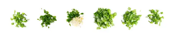 Photo of Chopped greens, garlic and parsley set isolated