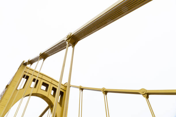 istock Yellow painted bridge upright and suspension supports 1293942407