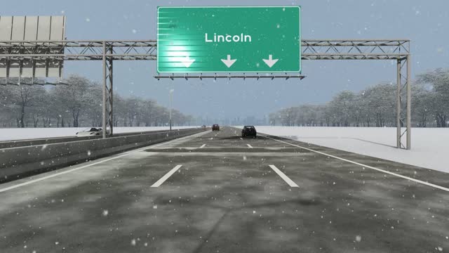 The concept of entrance to USA city, Lincoln, signboard on the highway stock video indicating