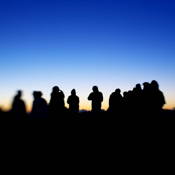 istock Silhouette of people on a hilltop 1293954616