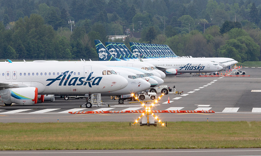 Portland, Oregon, USA - May 16th, 2020. Due to the slow down in air travel during the coronavirus pandemic, Alaska Airlines were forced to take planes out of service for most of 2020. Runway 21/3 was used as a parking lot at Portland International Airport during this time.