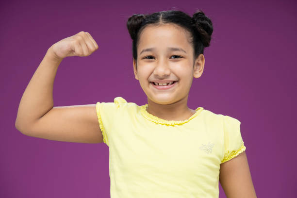 Happy smiling child girl, stock photo Indian,Girl, Child, Smiling, Happiness, Cute, topknot stock pictures, royalty-free photos & images