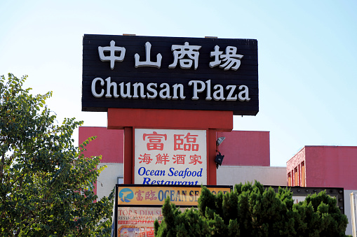 Los Angeles, CA, USA - December 29, 2020: Street view of Chinatown, Los Angeles.\n\nLots of pedestrians were observed.