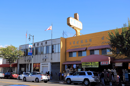 Los Angeles, CA, USA - December 29, 2020: Street view of Chinatown, Los Angeles.\n\nLots of pedestrians were observed.