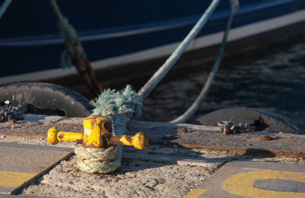 istock bollard and rope on the pier, makefast, 1293972118