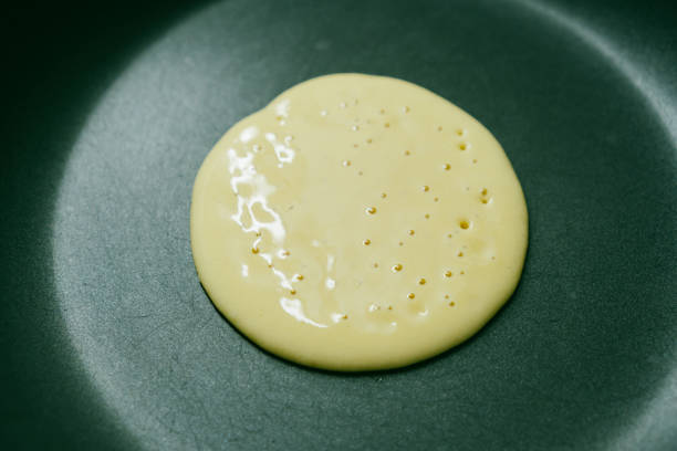 One plain pancakes on a white background. Top view.