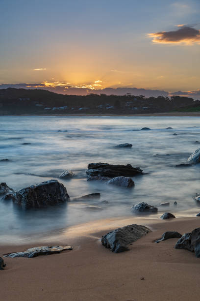 istock Sunset, rocks and the sea 1293977364