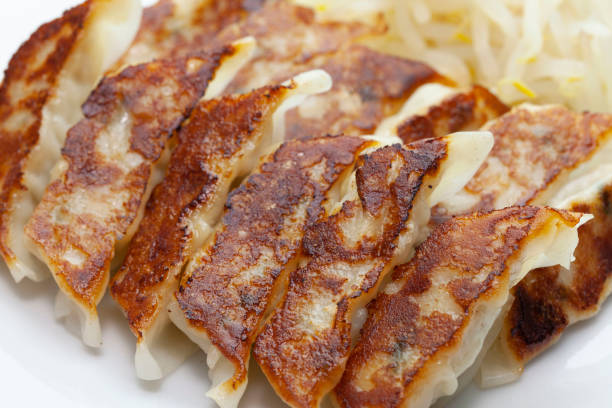 istock Close up of baked dumplings 1293991244