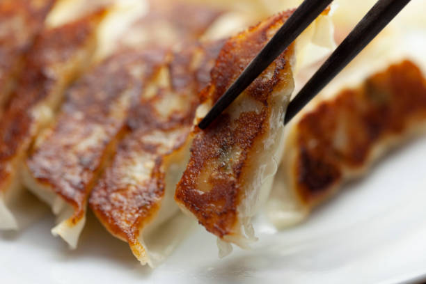 istock Close up of baked dumplings 1293991265