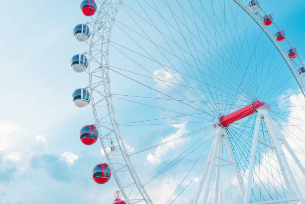 istock Ferris wheel with blue sky 1293998360