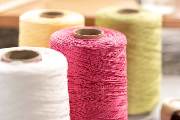 Threads in reels. Colored bobbins for embroidery knitting hobby accessories creativity. Background for site