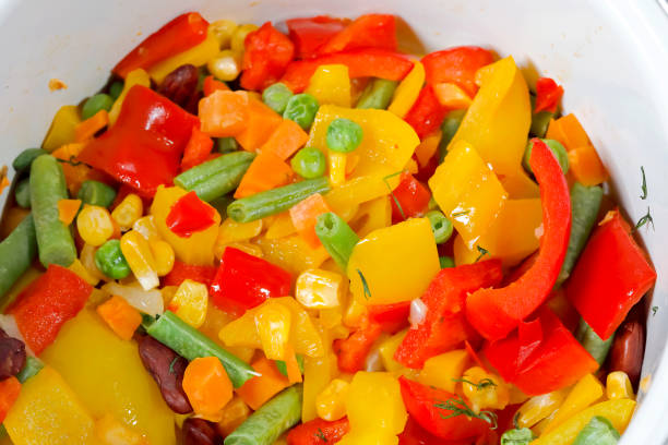 istock Pieces of various vegetables in the pot 1294003176