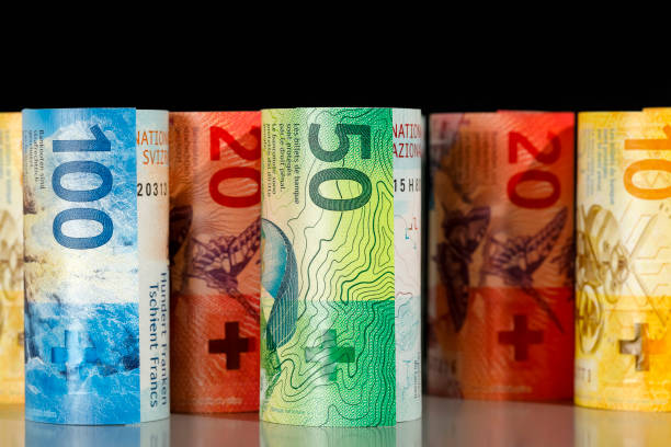 istock There are rolled-up Swiss banknotes 1294003235