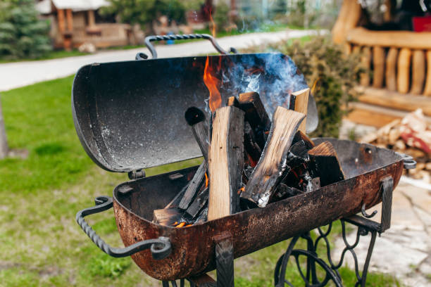 istock Barbecue grill with fire on nature 1294005104