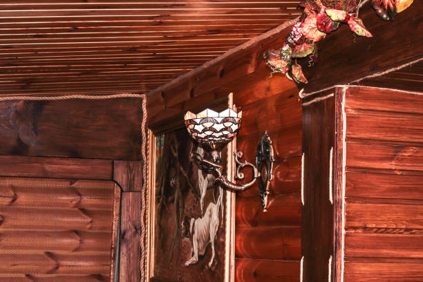 istock Wooden interior with vintage wall sconces 1294007004