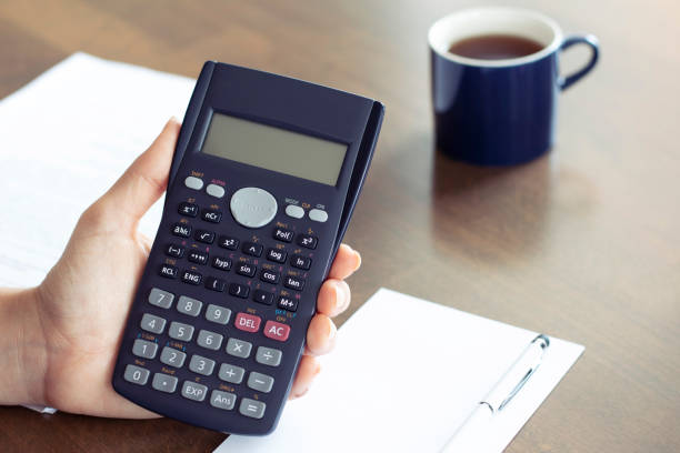istock Calculator, pen, documents and coffee. working place. finance accounting 1294007971