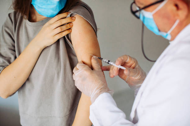 istock Young women receiving coronavirus vaccine 1294009018