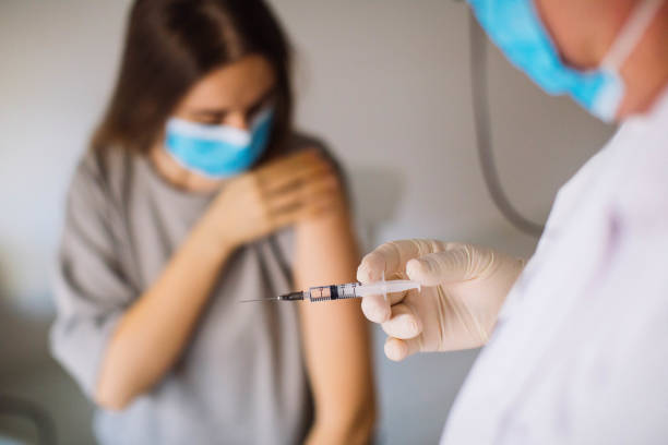 istock Young women receiving coronavirus vaccine 1294009084