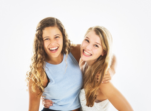 Lovely teenager and young woman share a moment of joy.