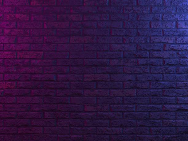istock Neon lights on old grunge brick wall room background 1294013813