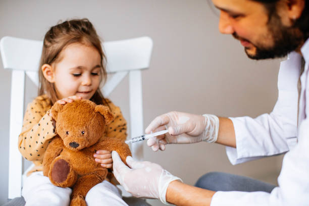 istock Vaccination to a child 1294014440