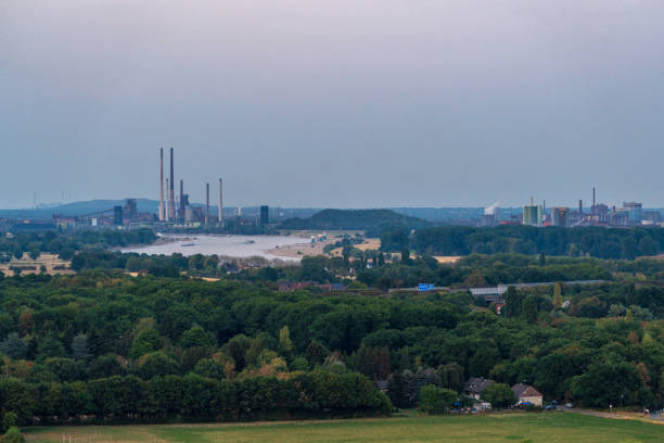 Moers, North Rhine-Westfalia, Germany - August 03, 2018: View over the Ruhr Area from Halde Rheinpreussen, looking northeast towards Duisburg, the River Rhine and the coking plant Schwelgern