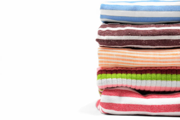 istock Fold striped clothes, tidiness, organizing concept. 1294025822