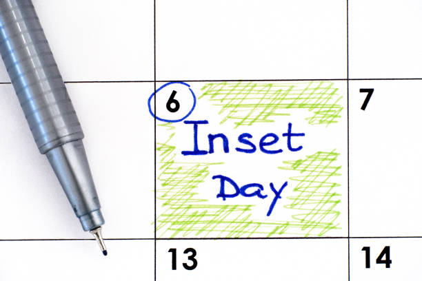 istock Reminder Inset Day in calendar with pen 1294028156