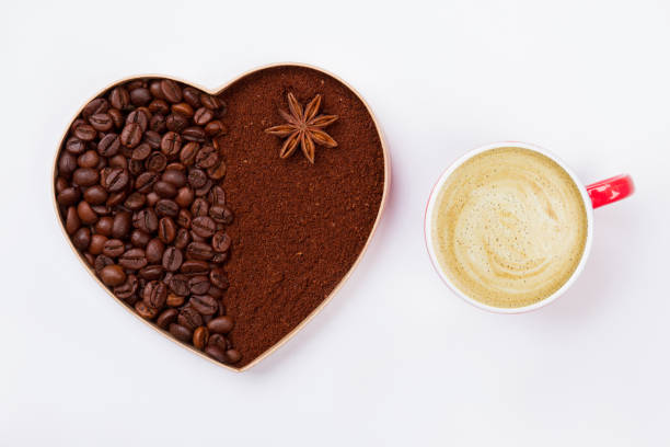istock Decorative coffee heart and cup of cappuccino. 1294028478