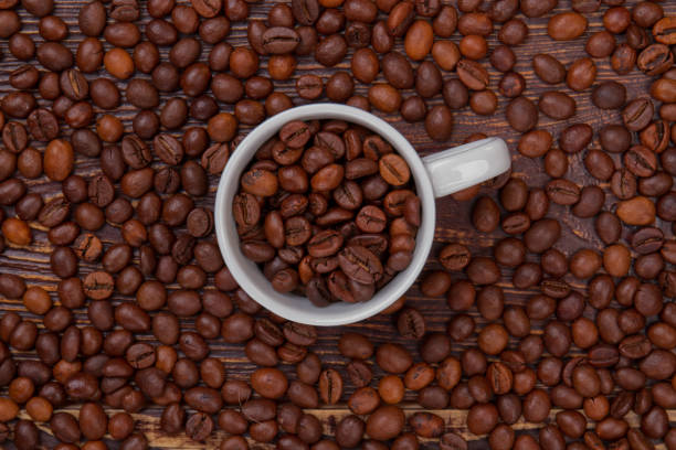 istock Top view cup of coffee beans. 1294029141