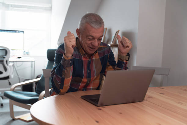 istock Man is working at home. Freelancer businessman using laptop 1294041038