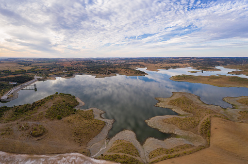 Drone aerial panorama of a dam lake reservoir landscape in Terena, Portugal