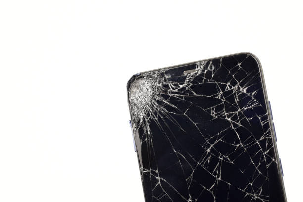 istock Wrecked smartphone on white background, Damaged smartphone needs repair 1294042152