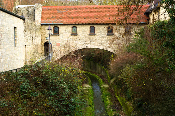 istock Old bridge with a river. Real state concept. Germany typical picture. 1294043082
