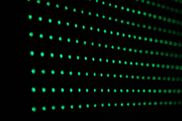 Colourful RGB LED lights on black background. LED Matrix with WS2812B strips. Playing animations and effects on digital LED display. Rainbow colours.