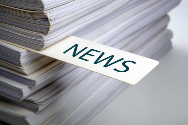 istock bookmark labeled news in a stack of documents concept close up 1294043401