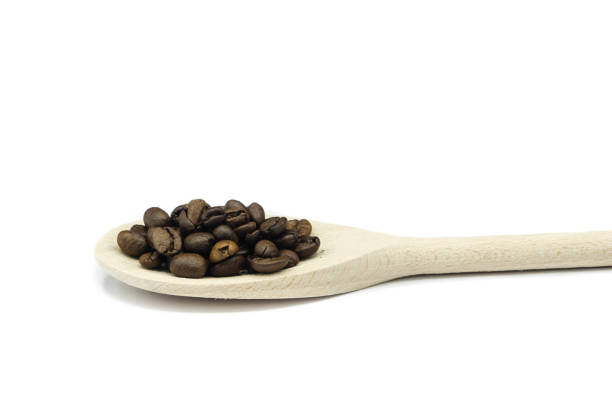 istock roasted coffee beans on wooden spoon isolated on white background 1294044006