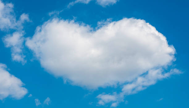 istock A heart-shaped cloud against the blue sky 1294045197