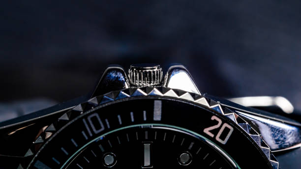 Close-up of a the crown of a men's wristwatch stock photo