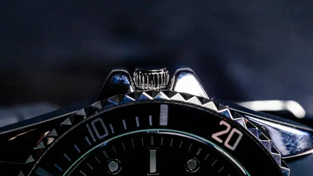 Photo of Close-up of a the crown of a men's wristwatch