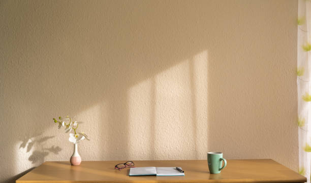 istock Notebook, cup, and white orchid on table, coronavirus, Covid-19, working at home 1294057467
